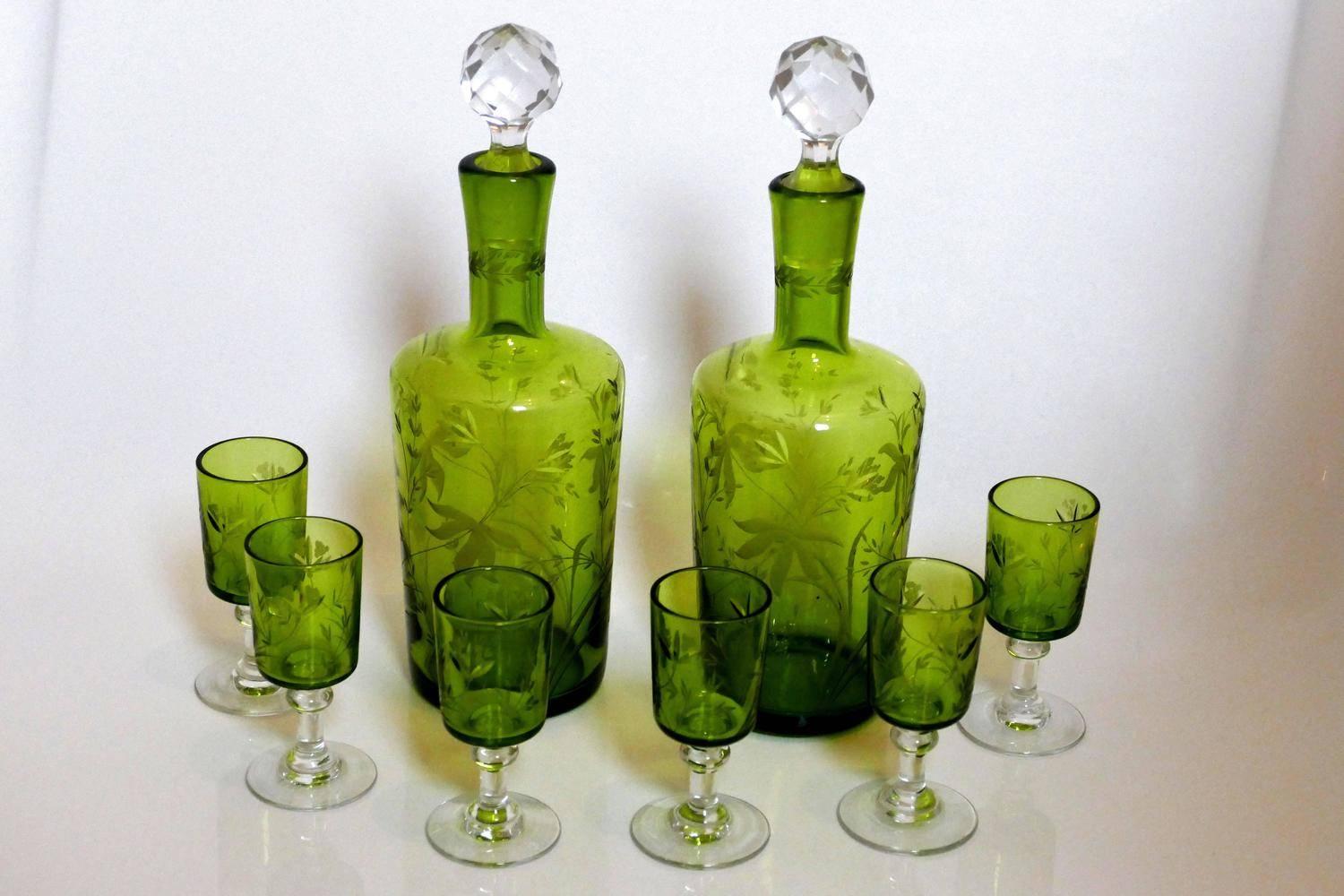 1900s St. Louis French green cut crystal liquor set, decanter pair and cordials.

Exceptional and antique French St Louis cut crystal liquor or aperitif service 8 pieces, circa 1900, comprised of two decanters and six cordial glasses. Amazing