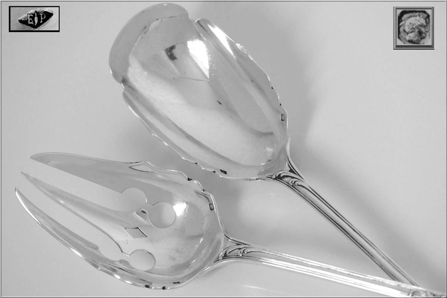 Puiforcat French all sterling silver salad serving set of two-piece Rococo.

Head of Minerve 1 st titre for 950/1000 French sterling Silver guarantee.

This salad serving set comprises a three-tined fork and a spoon with the polylobed bowl. The