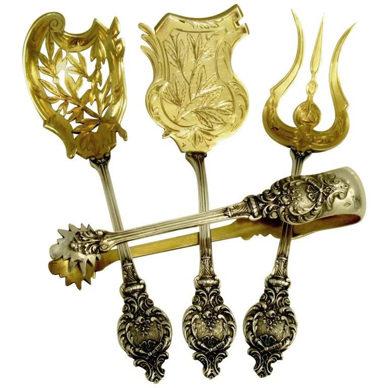 CANAUX fabulous French all Sterling Silver 18k Gold Dessert Hors D'oeuvre set of four pieces with original box Torches

A set of truly exceptional quality, for the richness of their decoration, not only for their form and sculpting, but also for