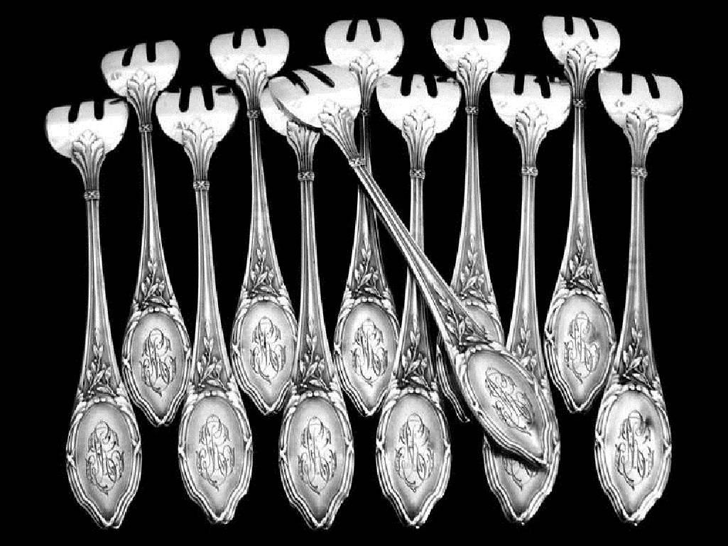 Soufflot antique French all sterling silver oyster forks 12 piece Louis XVI pattern.

With three slightly curved tines, the stems and handles are decorated with ribbons and laurels motif in Louis XVI style.

Head of Minerve 1st titre for