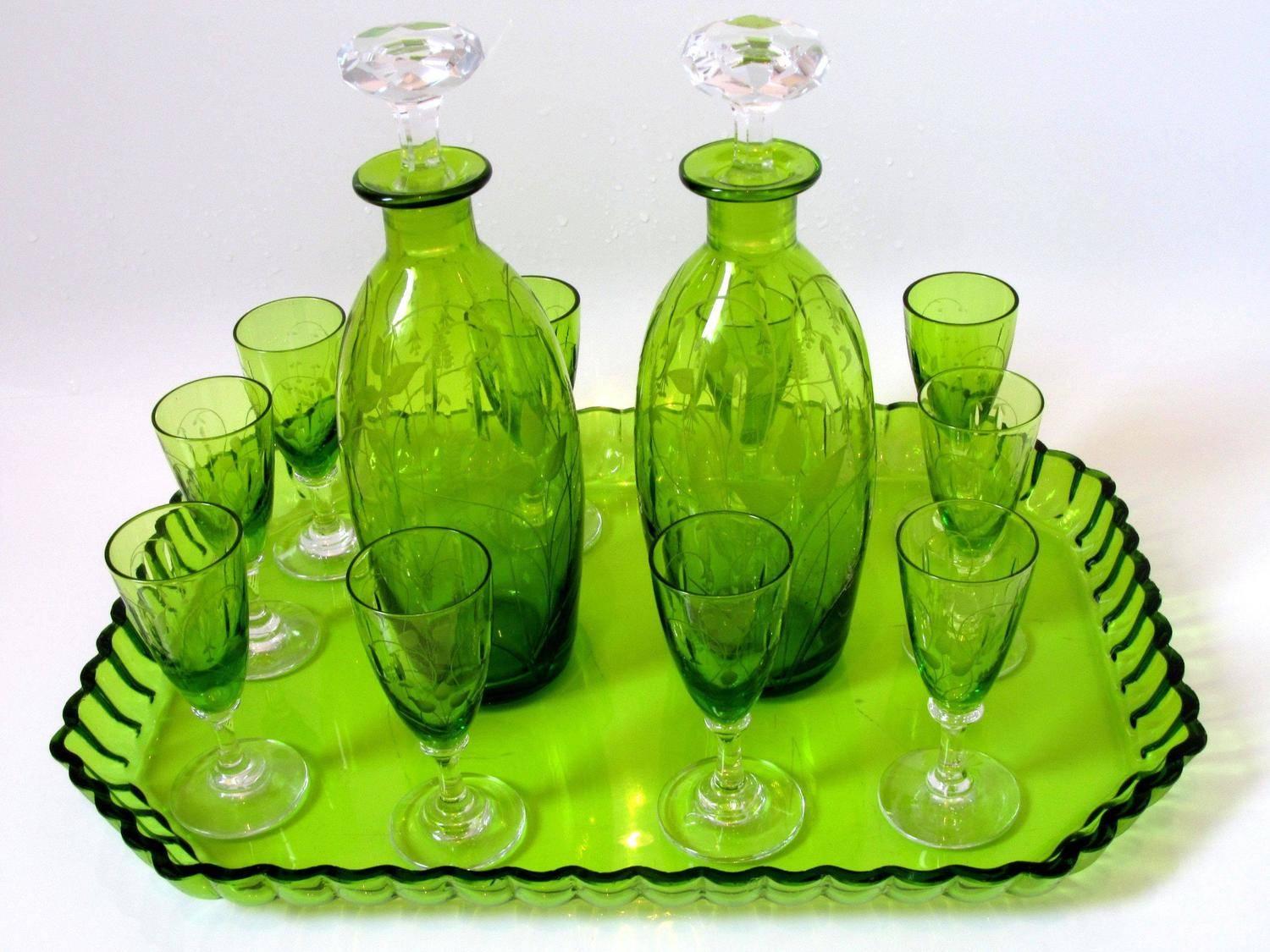 1900s St. Louis French green cut crystal liquor set - decanter cordials and tray.

Exceptional and antique French St Louis cut crystal liquor or aperitif service circa 1900, comprised of two decanters, nine cordial glasses and tray. Amazing