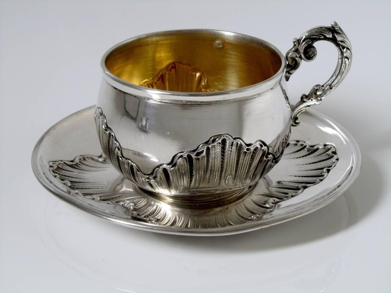 Pair of French Sterling Silver 18k Gold Coffee/Tea Cups w/Saucers Rococo

Head of Minerve 1 st titre for 950/1000 French sterling silver vermeil guarantee. The quality of the gold used to recover sterling silver is a minimum of 750 mils