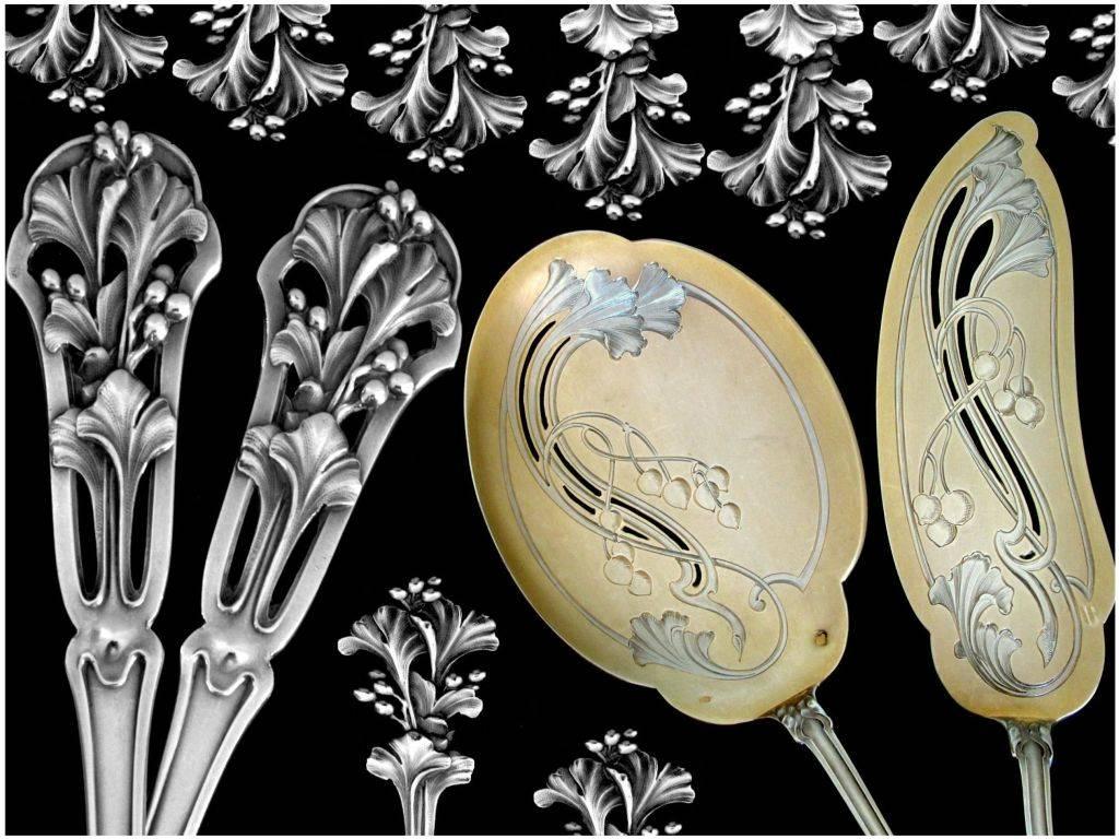 Soufflot rare French all sterling silver 18-karat gold ice cream set mistletoe.

A very rare French sterling silver Vermeil ice cream two-piece set of truly exceptional quality, for the richness of the decoration, the form and sculpting. A