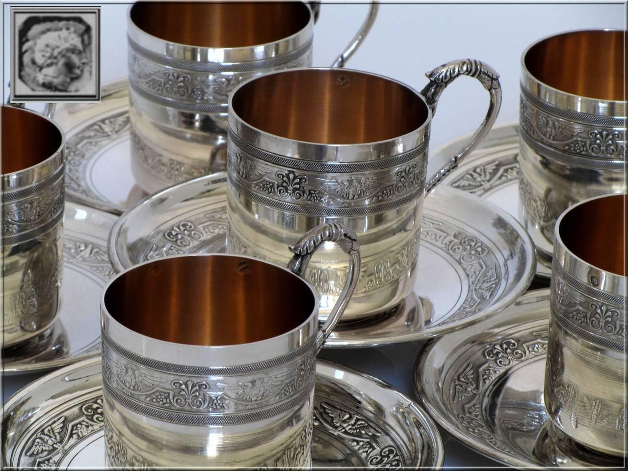 Molle Ornate French sterling silver 18-karat gold six coffee tea cups with saucers imperial eagles.

Head of Minerve 1 st titre for 950/1000 French sterling silver vermeil guarantee. The quality of the gold used to recover sterling silver is a