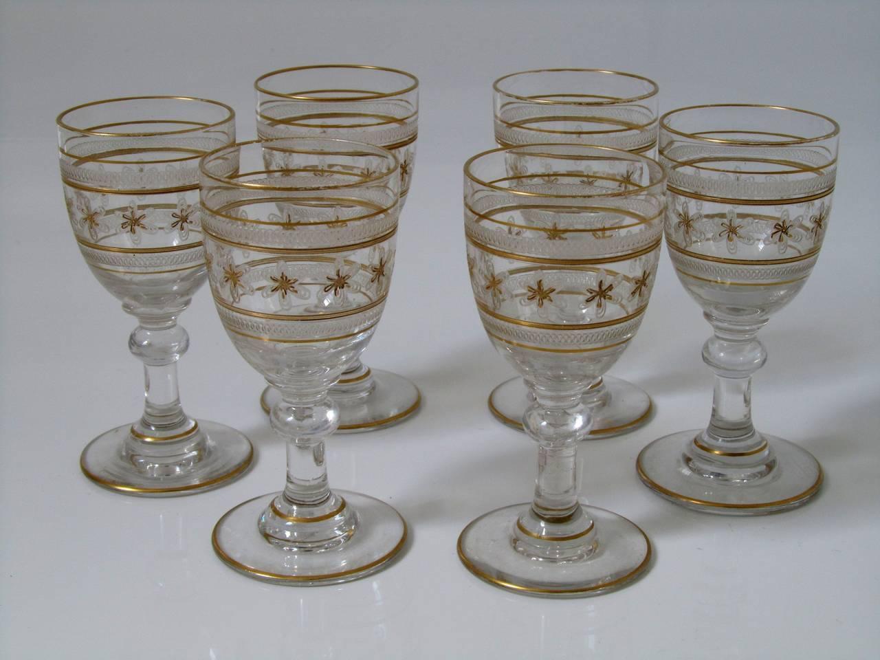 Saint Louis antique French enamel gold crystal liquor or aperitif service seven-piece.

Antique French Saint Louis crystal liquor or aperitif service, circa 1908. Comprising of a liquor decanter and six cordial glasses. Fine quality crystal,