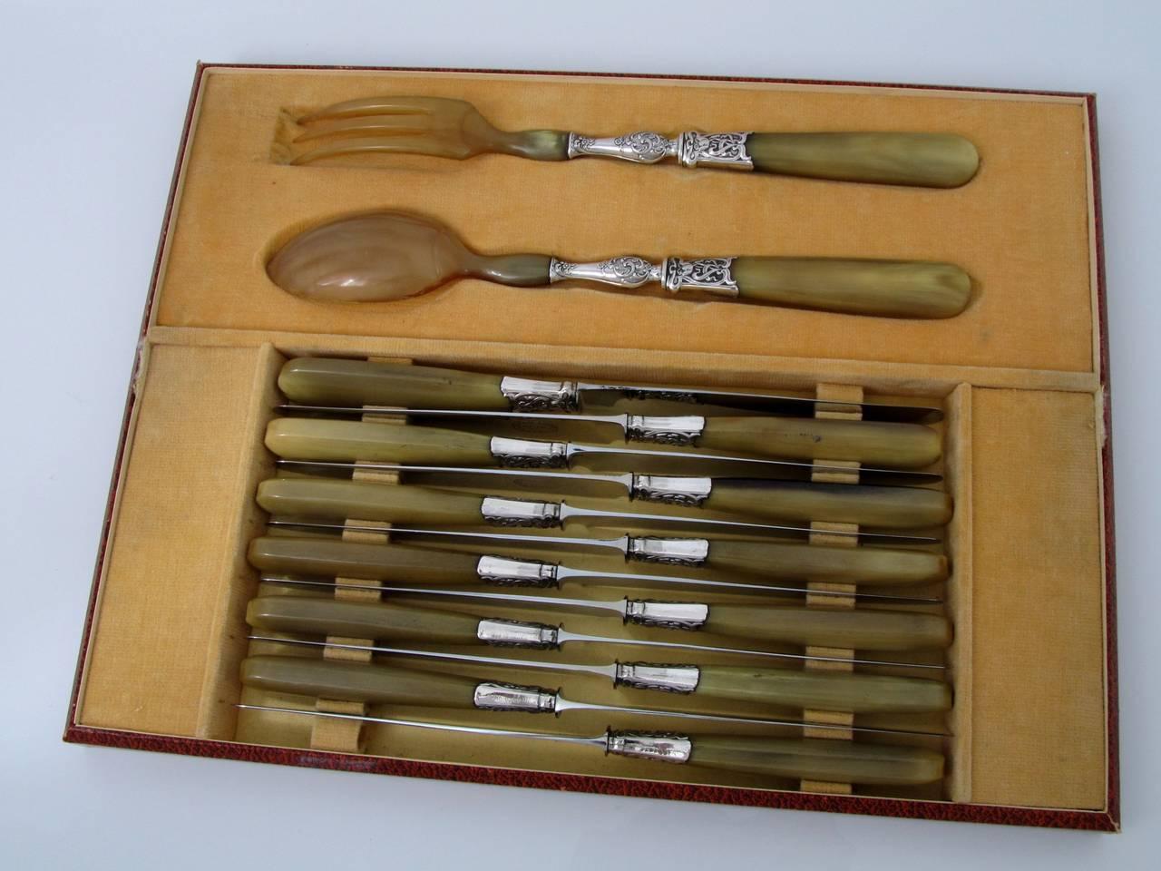 French horn sterling silver table knife set of 24 pieces with matching serving pieces and original box.

Swan marks for 800/1000 French sterling silver guarantee.

Rare Art Nouveau decoration, one of the most sought after models
by lovers of