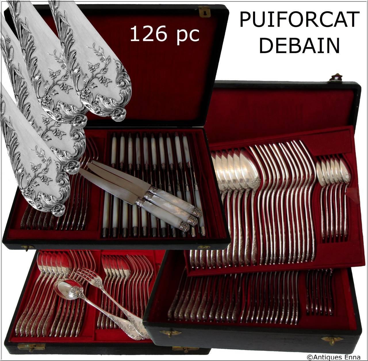Head of Minerve 1st titre for 950/1000 French sterling silver guarantee.

Fabulous French sterling silver flatware 126 pieces with fantastic decoration in the Art Nouveau style. This flatware is presented in three storage chests.

Two prestigious
