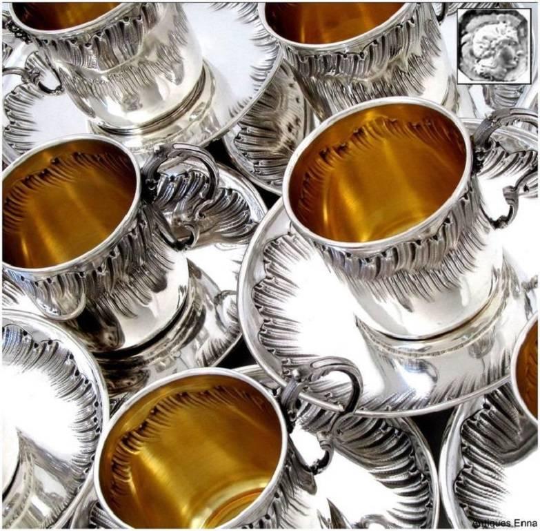 Boulenger rare French sterling silver 18-karat gold twelve coffee or tea cups with saucers.

Head of Minerve 1st titre for 950/1000 French sterling silver Vermeil guarantee. The quality of the gold used to recover sterling silver is a minimum of 750