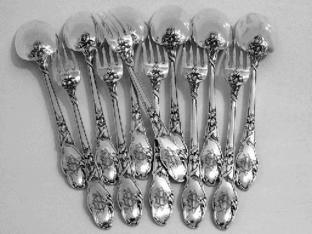 Ravinet rare French sterling silver dinner flatware set 12 pieces Iris pattern 

The handles having exaggerated Art Nouveau decoration with iris pattern. Two sets of 12 pieces available.

To complete this set, check out our other items and don't