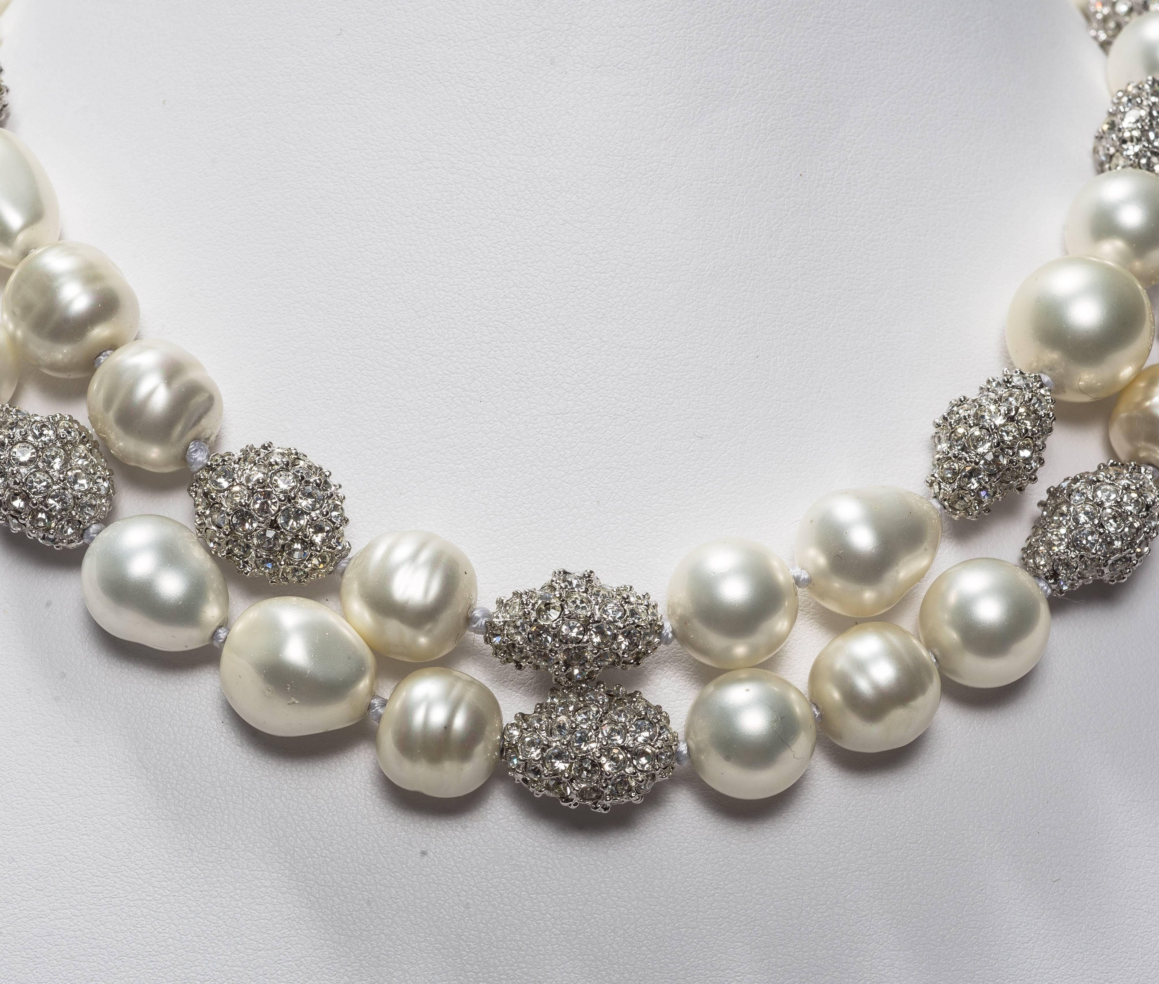 Vintage Bergdorf Goodman fabulous pave Swarovski crystal Japanese faux baroque glass pearl long necklace made in 1997. The pearls measure around 12mm and the 18 pave beads measure 3/4'' long. All hand silk knotted to a pave ball clasp. The necklace