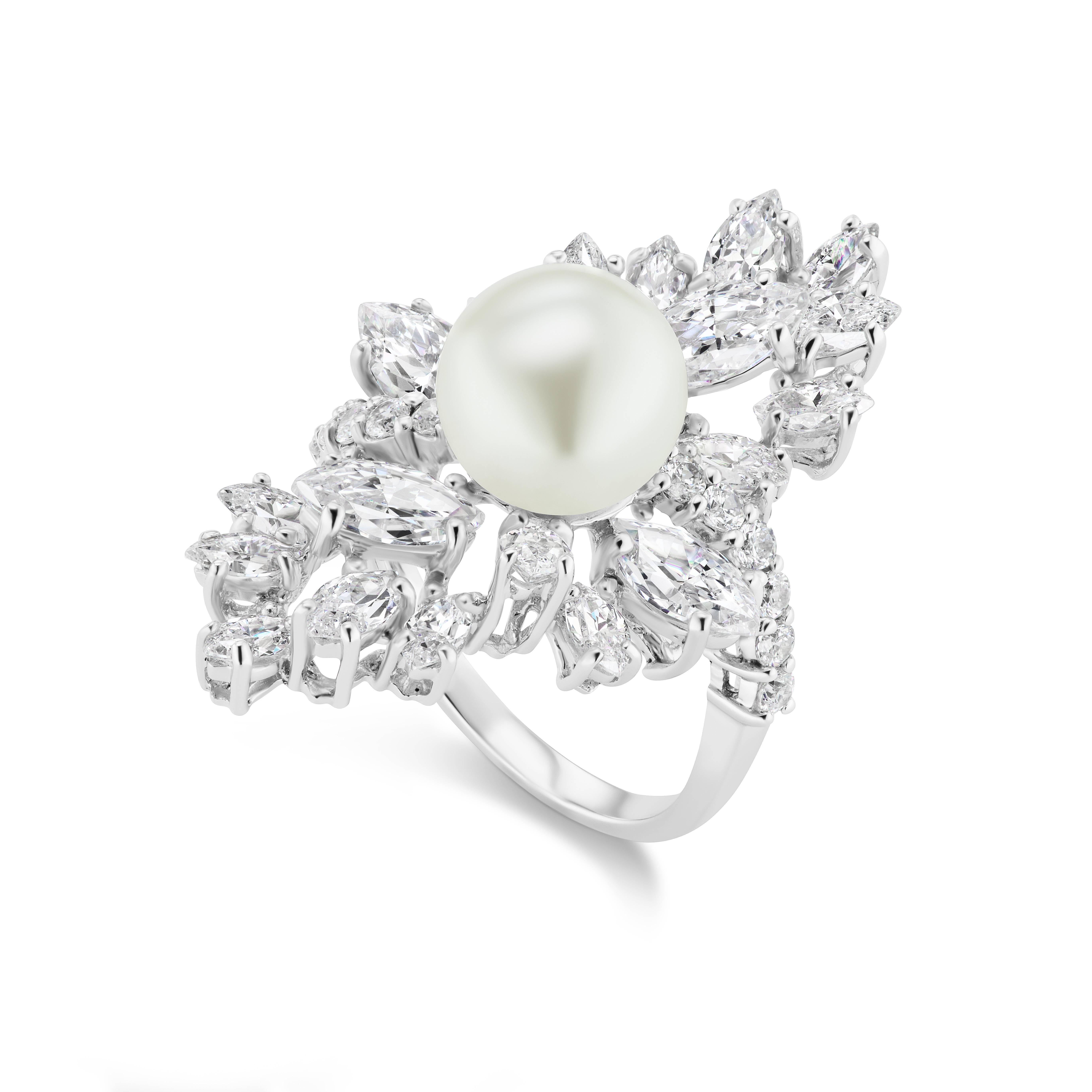 Magnificent  Costume Jewelry Faux Diamond Pearl Freeform Style Cocktail Ring Set With Petite CZ Marquises And Rounds On the Sides Centering A 10mm Faux Pearl Set In Rhodium Sterling. Free Sizing 