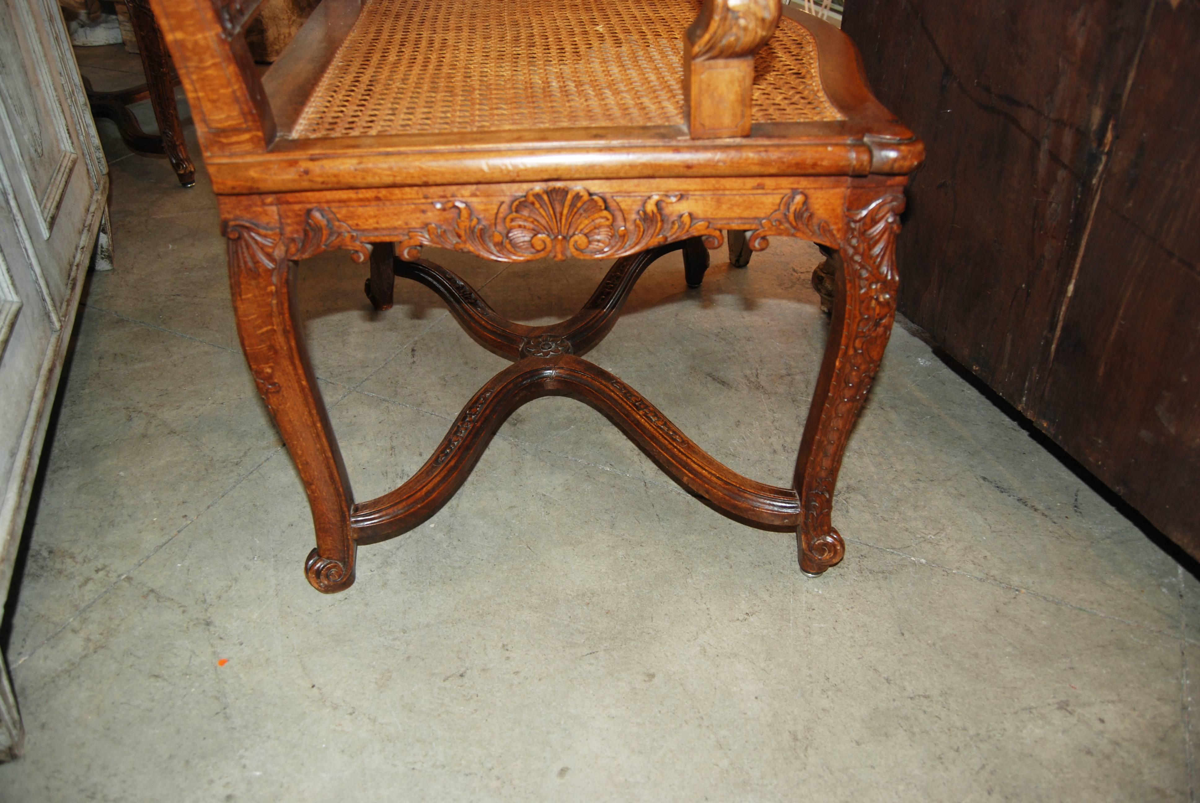 Beautifully carved walnut armchairs.