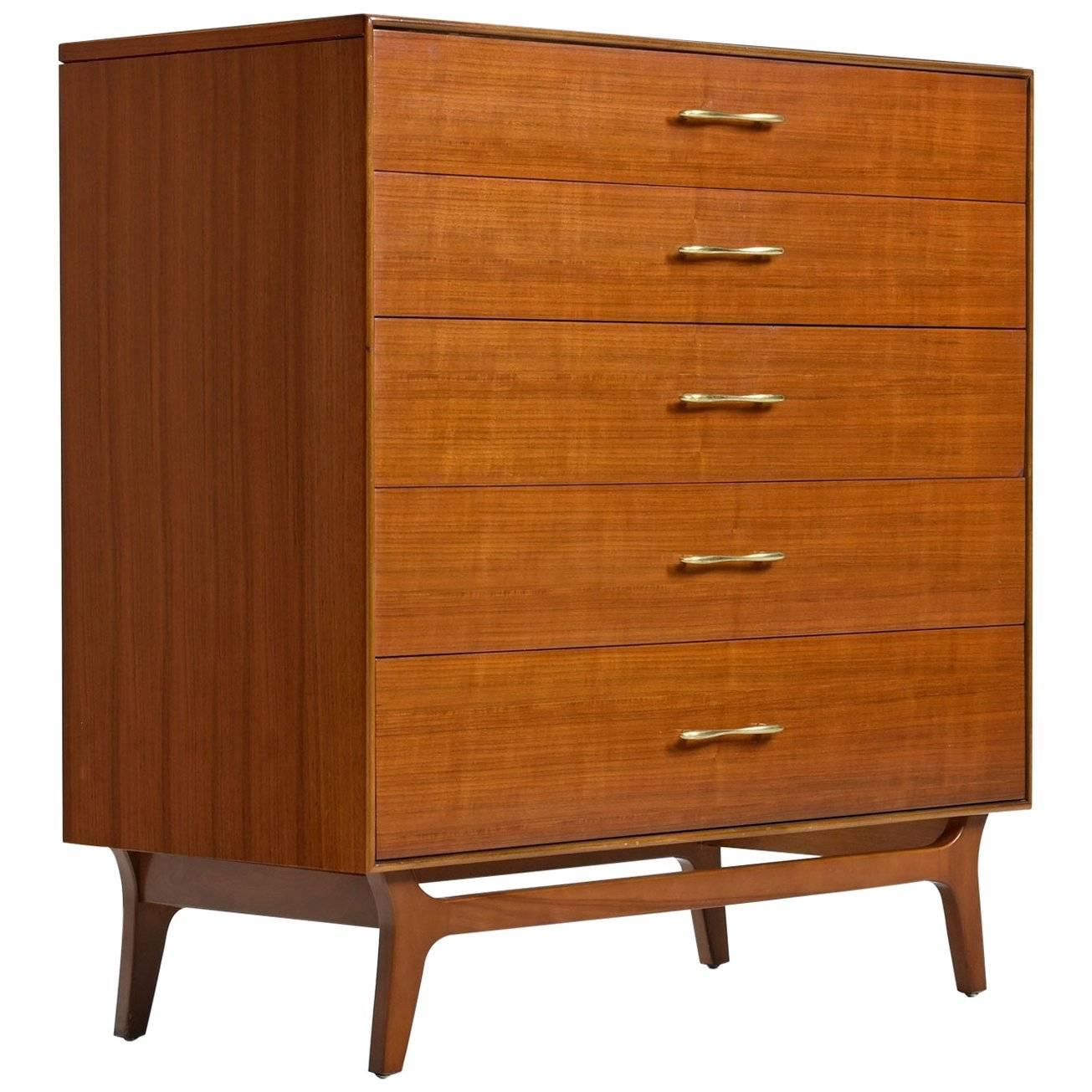 This Mid-Century Modern five-drawer dresser by Rway features expert craftsmanship and spectacular walnut wood. The dresser comes with a piece of polished white stone to accent and protect the top surface. Place perfume bottles, drinks and toiletries