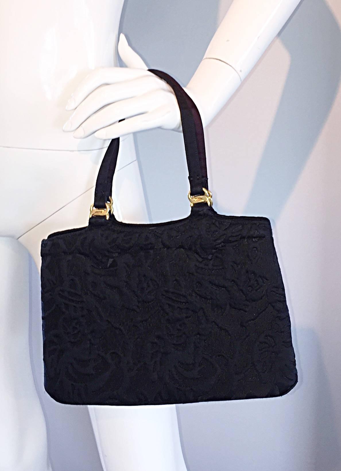 Beautiful brand new 50s KORET handbag/purse! Chic style, that has never been used. Hand-sewn black embroidery, on the finest black silk! So much detail was used to produce this beauty---they just don't make them like this anymore! Snaps shut in the