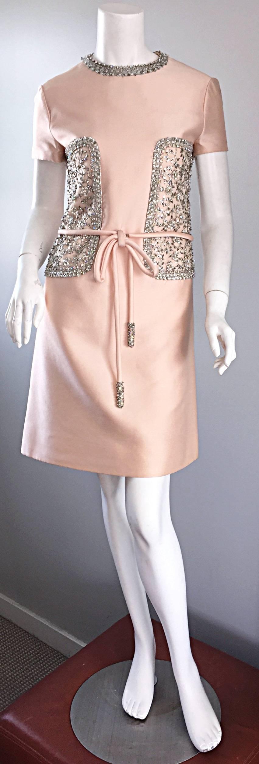 The most unbelievable vintage 60s PAT SANDELR light pink silk dress! Features hundreds of hand-sewn rhinestones and crystals throughout the sides, collar and attached rope belt! Such intricate couture work from a master American designer. Hand-sewn