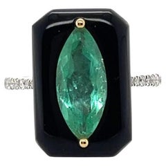 18ct White Gold Marquise Colombian Emerald, Onyx & Diamond Ring
