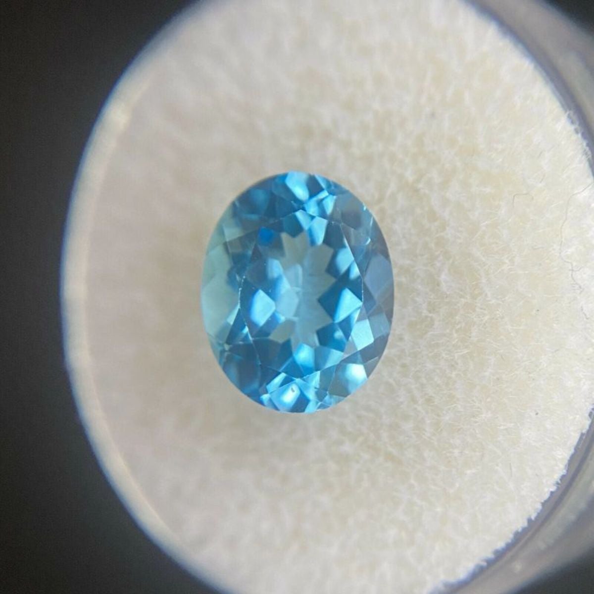 thumbnail image 2 of SWISS BLUE TOPAZ 16 X 12 MM OVAL CUT ALL NATURAL AAA F-511 2 of 14