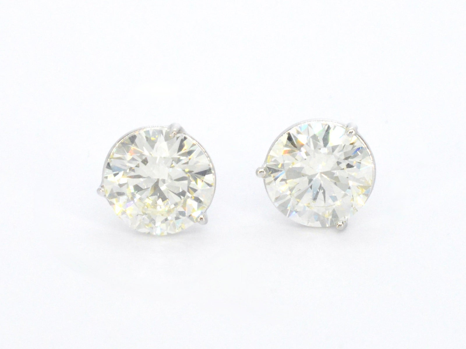Golden Solitaire Earrings of total 10.00 carat. For Sale