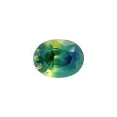 Saphir bicolore d'Australie 0,98 carat, bleu vert, taille ovale 6,4 x 4,8 mm VS