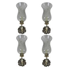 A Set of Four Storm Shade Wall Sconces