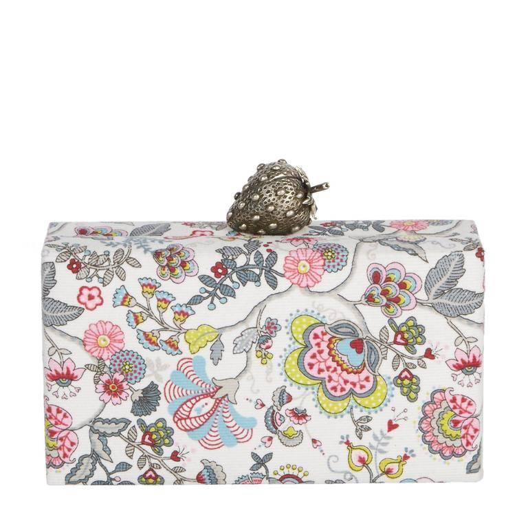 Jean strawberry sloral in multi color floral printed corduroy featuring a metal novelty clasp with signature floral printed lining.

Magnetic closure
Corduroy exterior and 100% cotton interior
Hinge closure
Features an interior mirror with etched