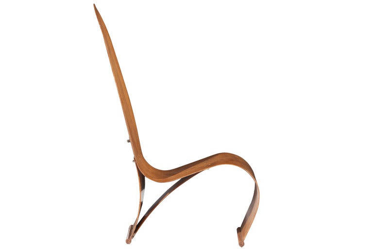 Early American modernist plywood chair designed by Herbert Von Thaden. H.V. Thaden’s chair stands out for its post-war application of plywood and technology. Comprised of three sheets of bentwood, this work features a slot fastener mechanism for