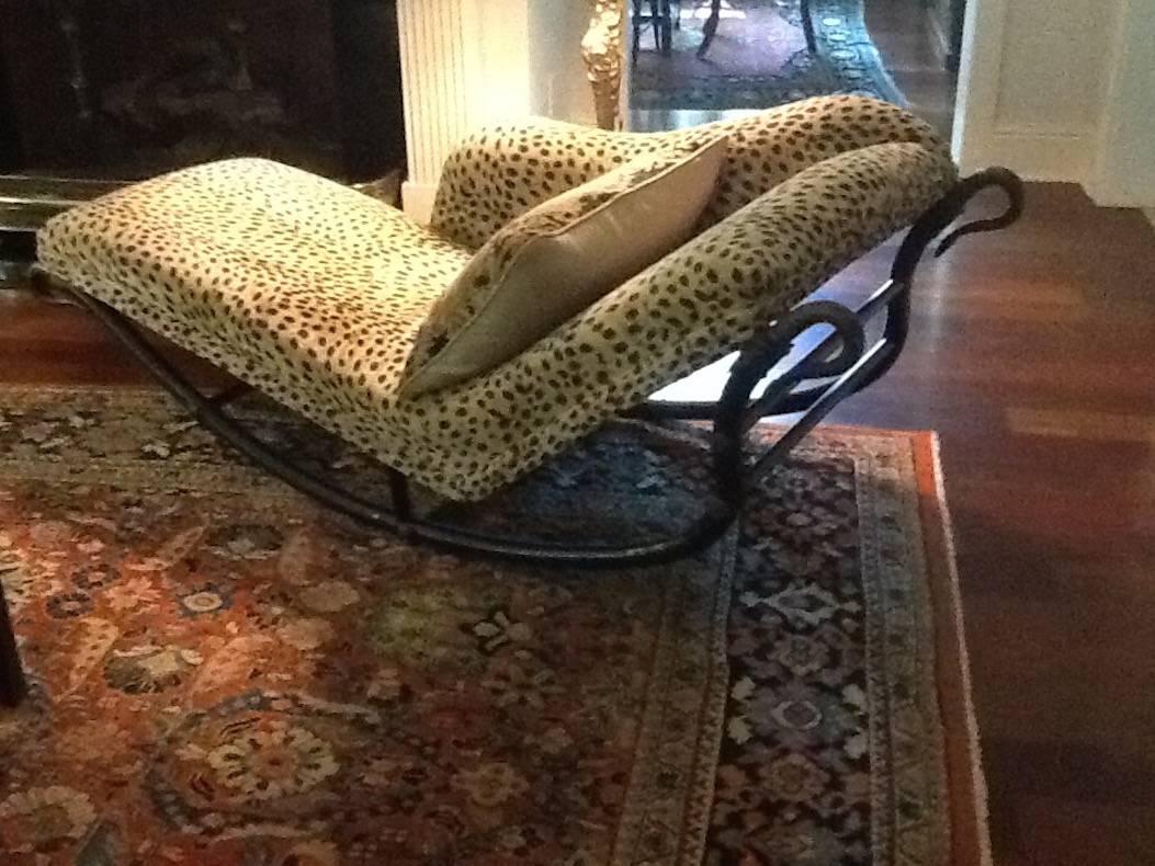 A rare find in this early19th century English Regency decorated rocking chaise from the Long Island NY Estate of John Hay Whitney.
Beautifully crafted with bronze rockers and finials of sculptural serpent heads.
Christopher Hyland leopard printed
