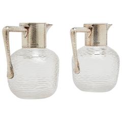 Antique Pair of Christopher Dresser Glass Pitchers