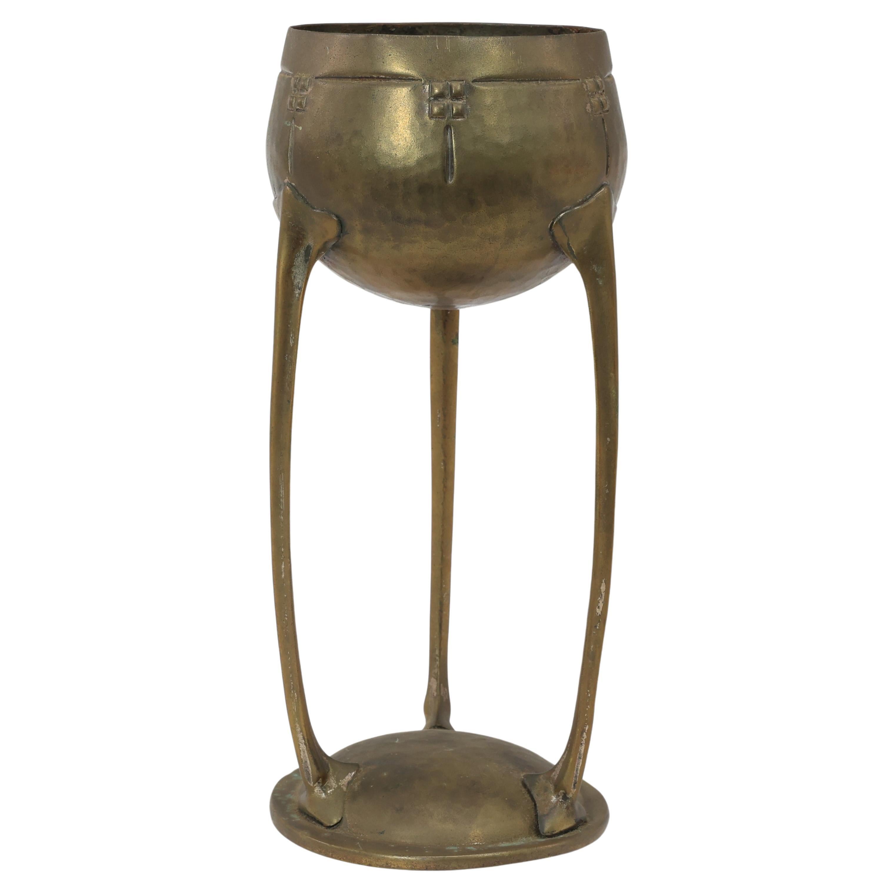 WMF. A hand beaten brass chalice, the bowl raised on three organic supports. For Sale