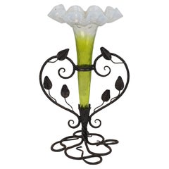 Art Nouveau French hand made iron epergne with a green & Vaseline glass flower.