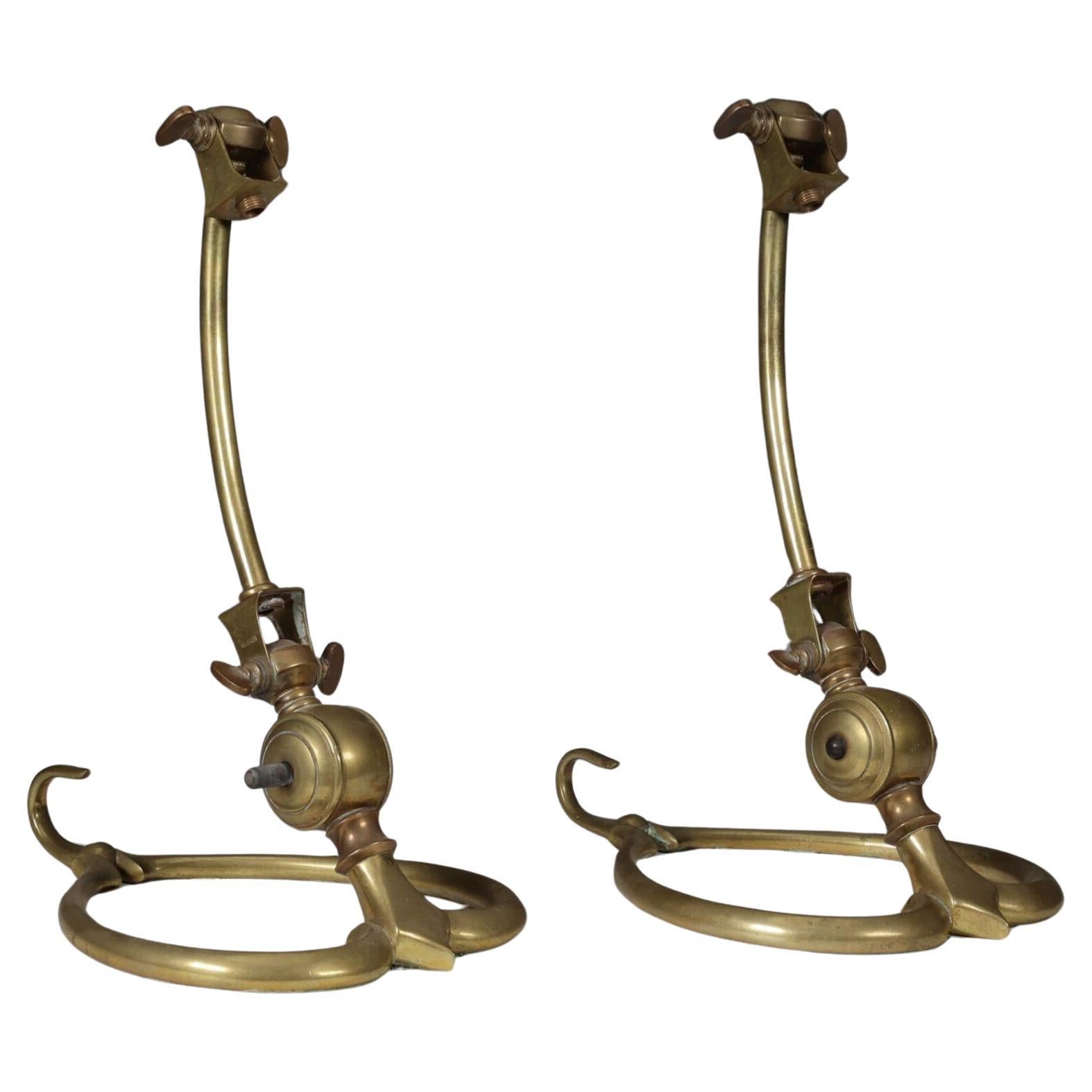 WAS Benson. A pair of Arts & Crafts brass table lamps with heart shaped bases For Sale