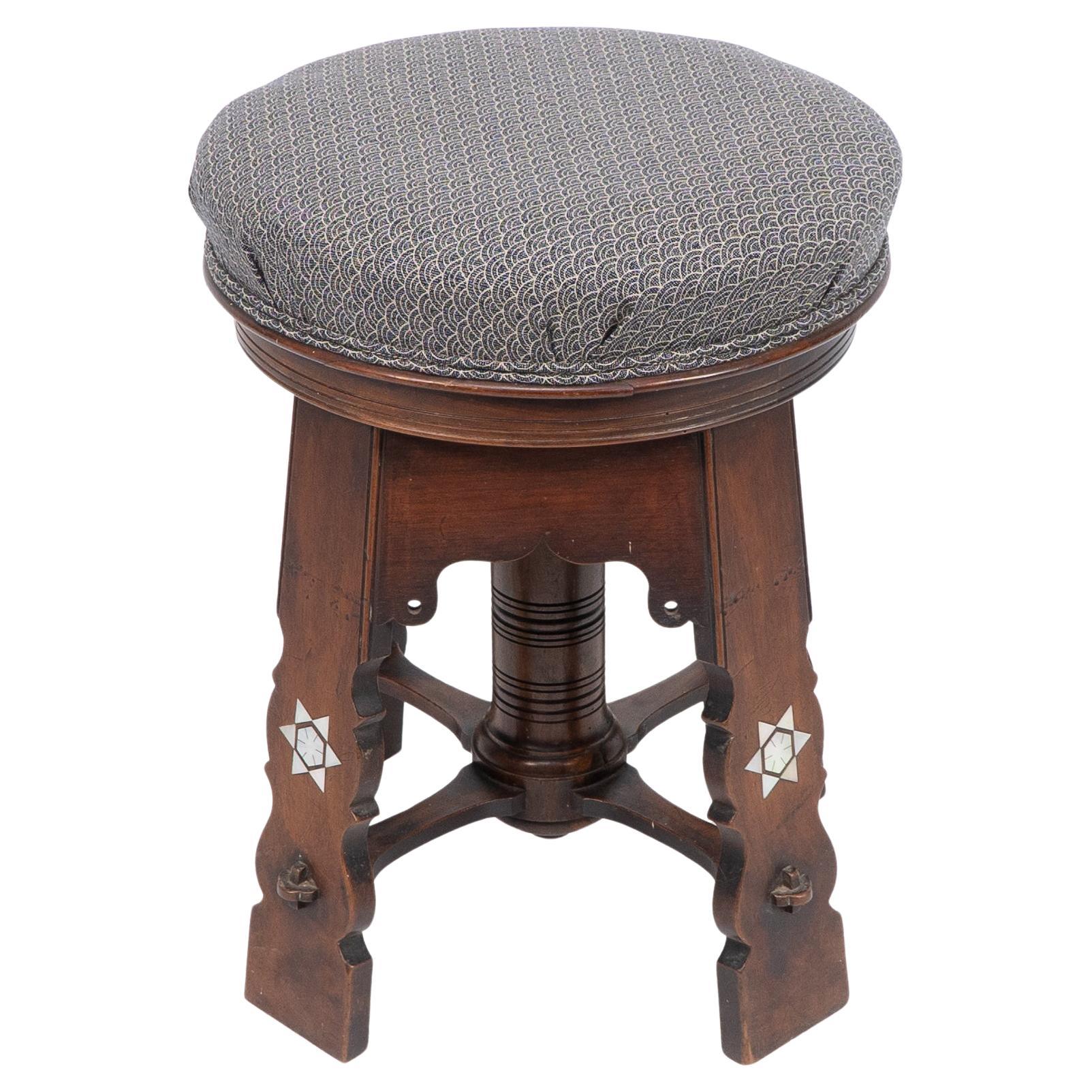 Liberty and Co attri. A rare Moorish walnut revolving stool with Moorish arches For Sale
