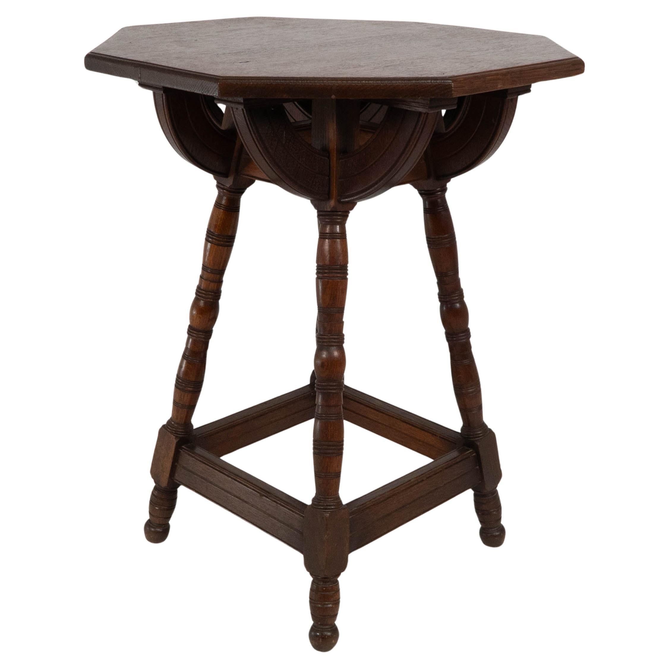 Collier and Plucknett. A rare Gothic Revival oak side table For Sale