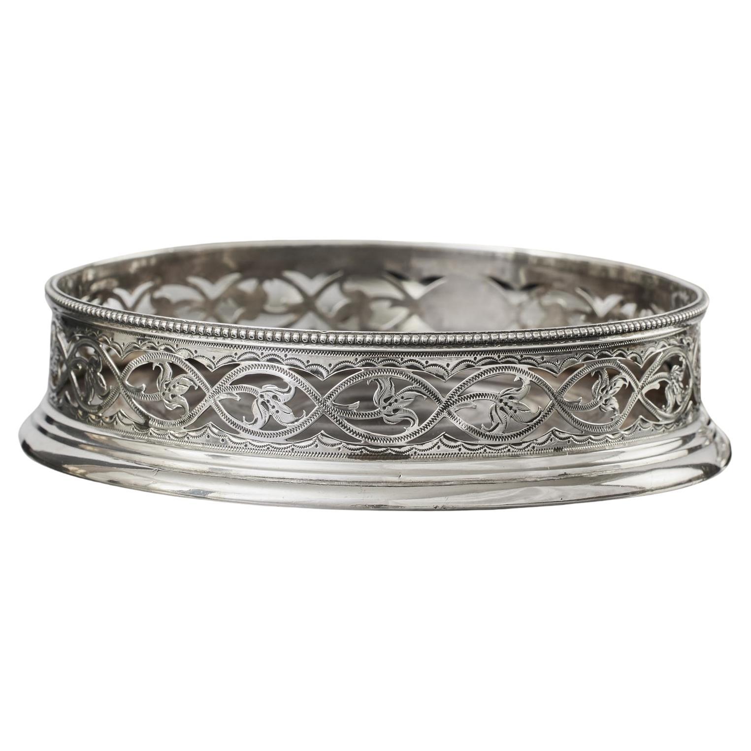 Set of four early-George-III pierced antique sterling silver wine coasters
