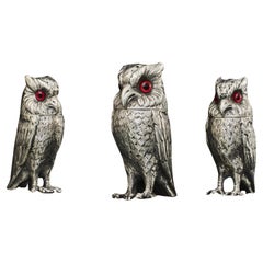 Set of three Antique sterling silver owl pepper casters