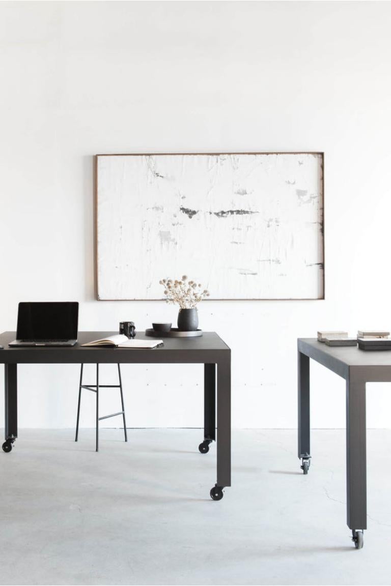 This table is custom made in Los Angeles. The entire piece is industrial steel. It's sheered to size, welded, and powder coated. The sheet metal top is supported by a birch substrate for added support

INDUSTRIAL STEEL, POWDER COAT FINISH