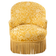 Silla de tocador tapizada con motivos florales del siglo XIX