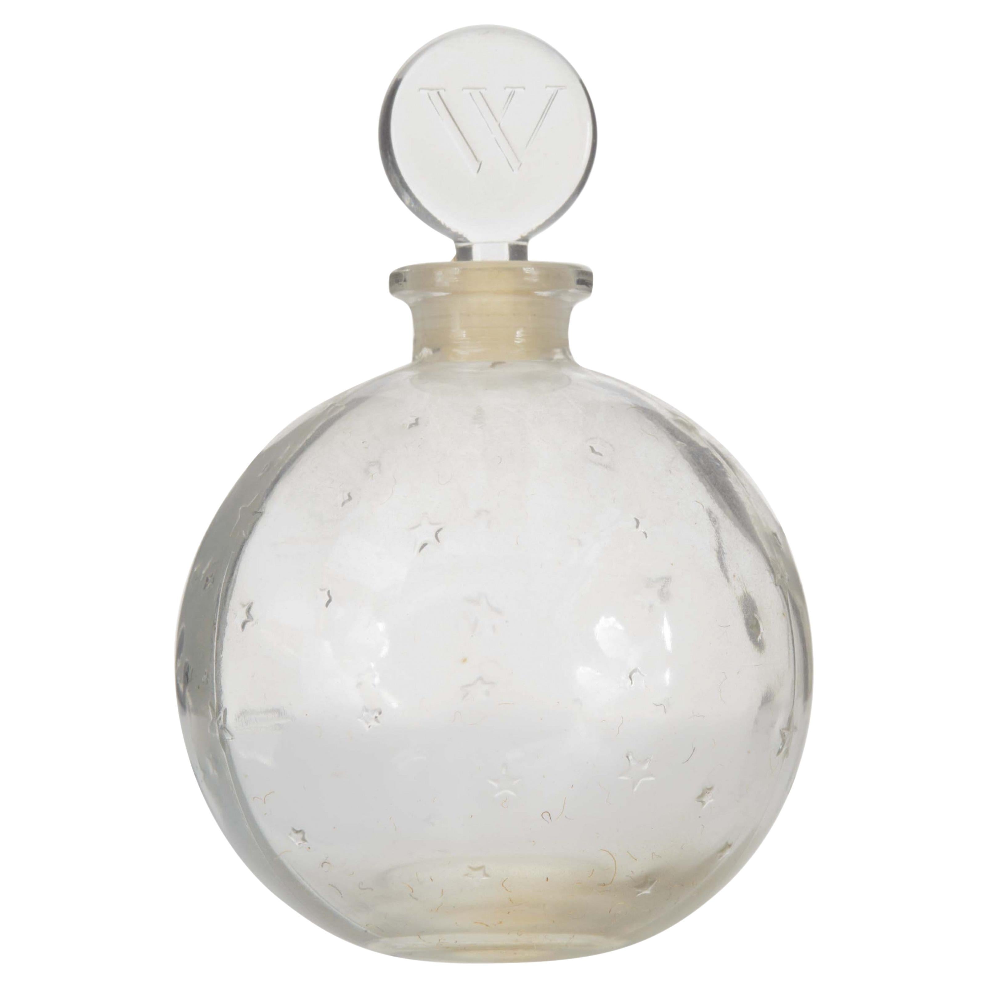 Flacon de parfum Art Déco français en forme d'étoile surélevée Lalique pour Worth en vente
