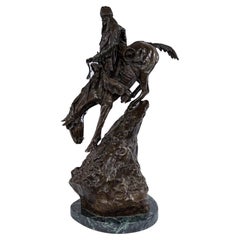 Hombre de montaña americano de bronce