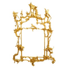 Miroir mural en bois doré de style Chippendale chinois anglais (manner de Thomas Johnson)