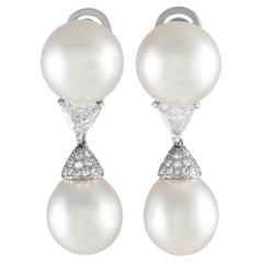 Cartier, boucles d'oreilles en platine, diamants 2,40 carats et perles