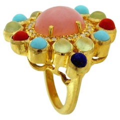 Blumenförmiger Ring mit mehreren Steinen und Diamanten aus 18 Karat Gold