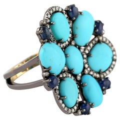 7.48ct Oval Shaped Turquoise Ring With Blue Sapphire & Diamonds In 18k Gold 