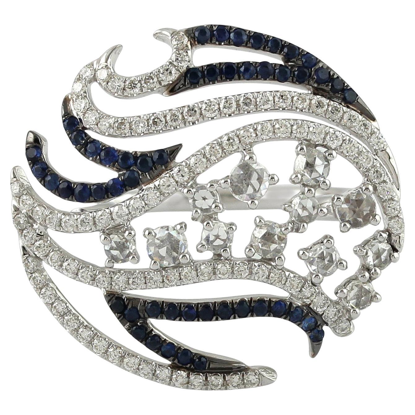 Runder Ring in Form eines blauen Saphirs und Diamanten aus 18 Karat Weißgold