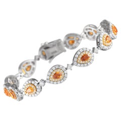 18K White & Yellow Gold 3.40ct White Diamond and 2.13ct Orange Diamond Bracelet 