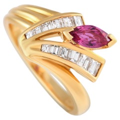 18 Karat Gelbgold Ring mit 0,40 Karat Diamant und Rubin 