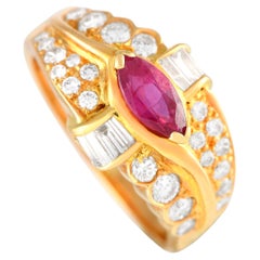 Marquise-Ring aus 18 Karat Gelbgold mit 0,90 Karat Diamant und Rubin 