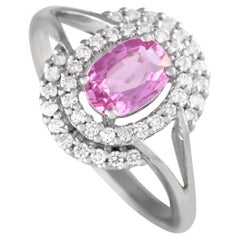 Bague en or blanc 18 carats, diamant 0,40 carat et saphir rose