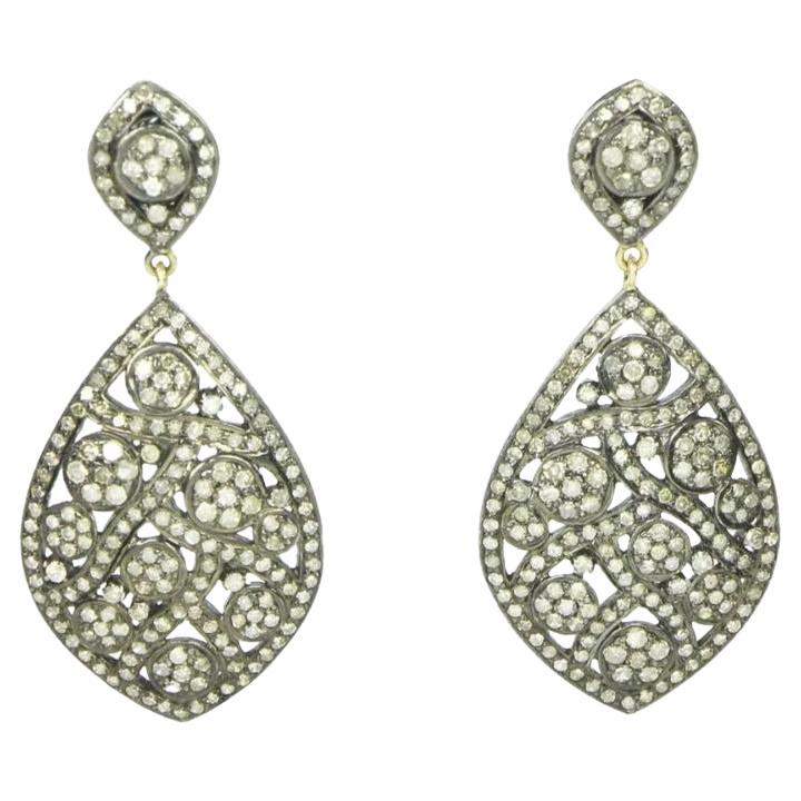 Boucles d
oreilles pendantes avec diamants pavés en or 14k et argent 925