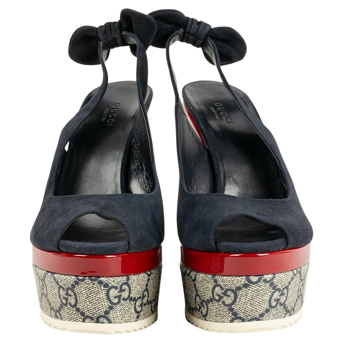 GUCCI - (Made in Italy) Blue suede and red patent leather sandals, monogrammed fabric and flower trays. Size 38.

Additional information:
Condition: Very good condition
Dimensions: Heel height: from 5 cm to 15 cm

SKU:CH27